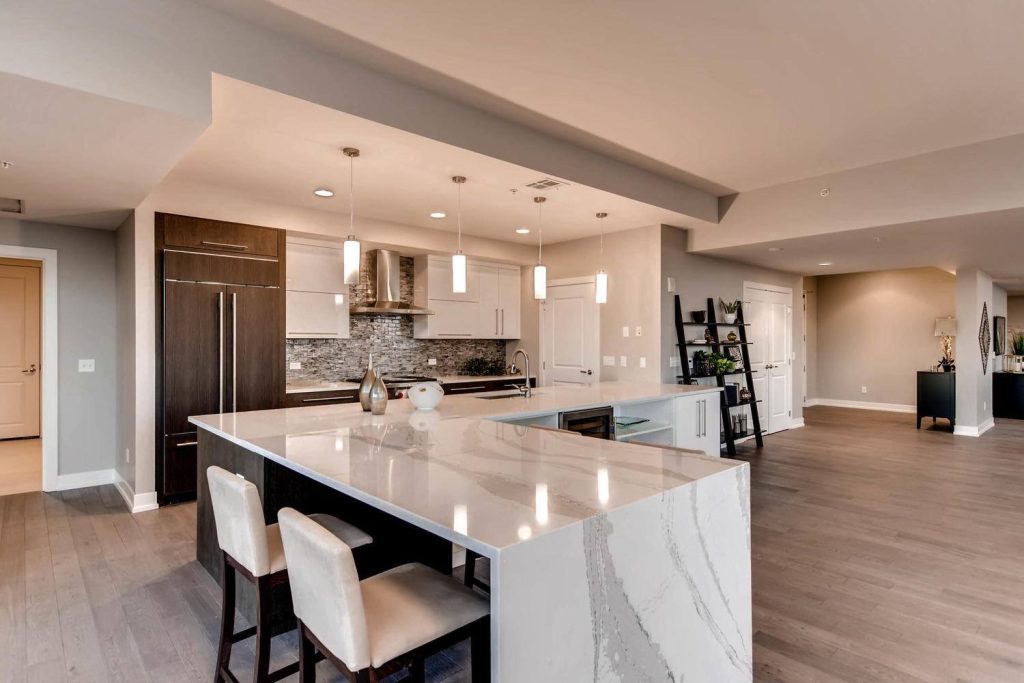 Examples of trending countertop colors and modern materials featured in current kitchen design trends, reflecting the signature elegance and functionality of Colorado styles.